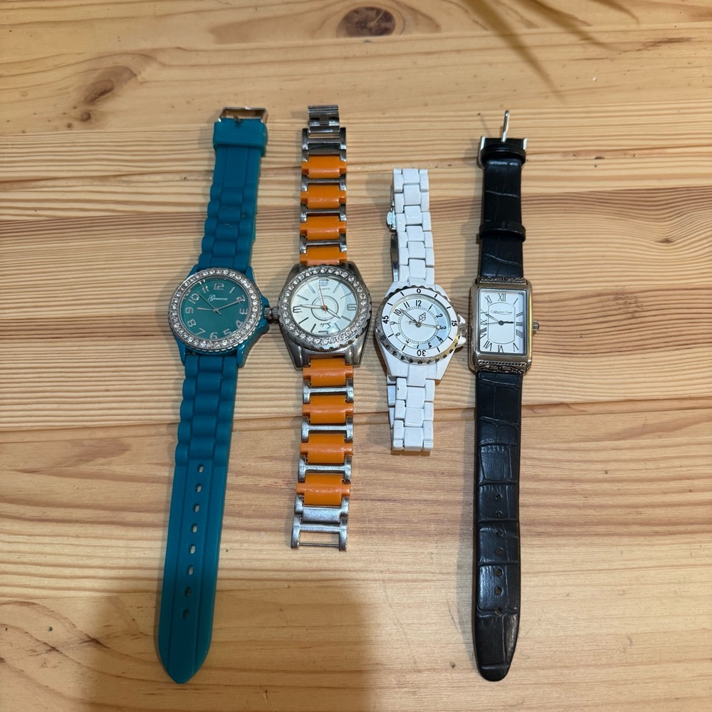 Set of Four Stylish Watches in Teal, Orange, White, and Black